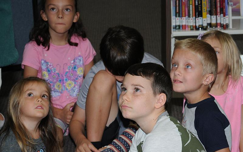 Youngsters paid close attention as Kathy Church of Smithgall Woods State Park talked about Creepy Crawlers at the Fannin County Public Library.