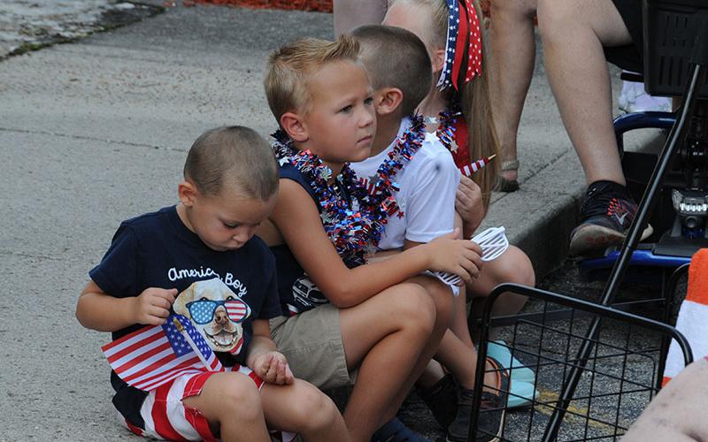 Children patiently waited for the all the activities planned for Ducktown after the Walking Parade.