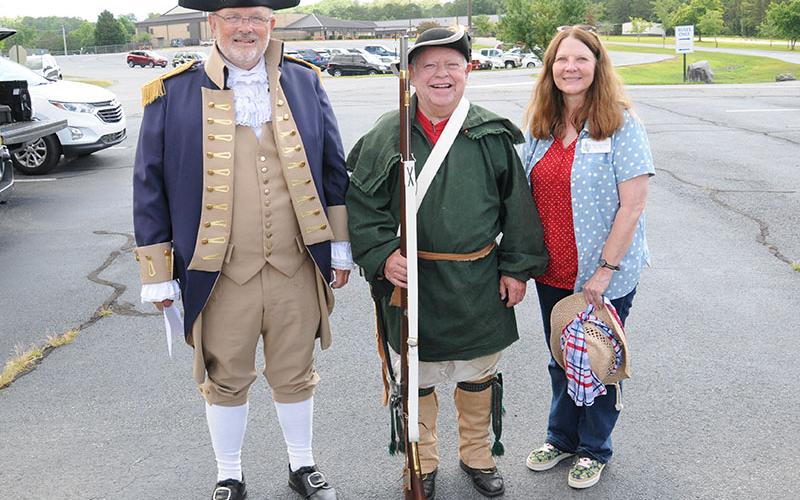 Jared Ogden, left, of the Sons of the American Revolution (SAR), was the guest speaker for the Independence Day celebration at Veterans Memorial Park in Blue Ridge. He is shown with fellow SAR member Jack Dugger and Pam Matthews of the Old Unicoi Trail Chapter of the Daughters of the American Revolution.