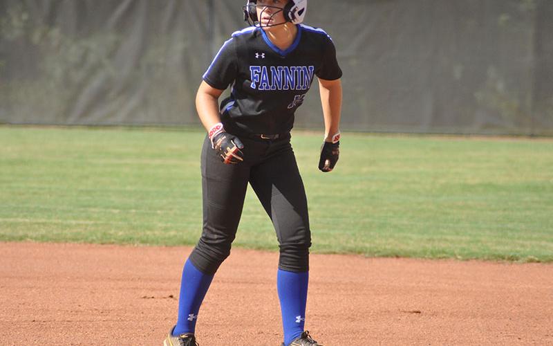 Callie Ensley, a sophomore, intently watches the play in recent action for the Lady Rebels Softball team.