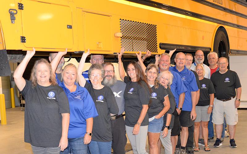 Several of Fannin County’s school bus drivers took part in the open house for the school system’s new Transportation Facility last week. They had a good time “holding up” a bus on one of the new lifts. Shown from left are; Melissa Beaver, Dana Imler, Billy Standridge, Frances Newberry, Glenn Lewis, Darrel Davis, Pepper McConnell, Lisa Cheatham, Robin Searcy, Sam Banks, Jeff Johnstone, Jeff Thomas, Julie Johnson, Gary Bailey, Tom Mills, and Junior Dillinger.