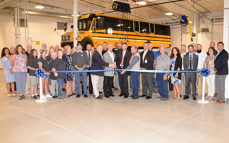 Fannin County school system officials, transportation department employees, contractors and community leaders gathered August 18 to cut the ribbon officially marking the dedication of the system’s new Transportation Facility.