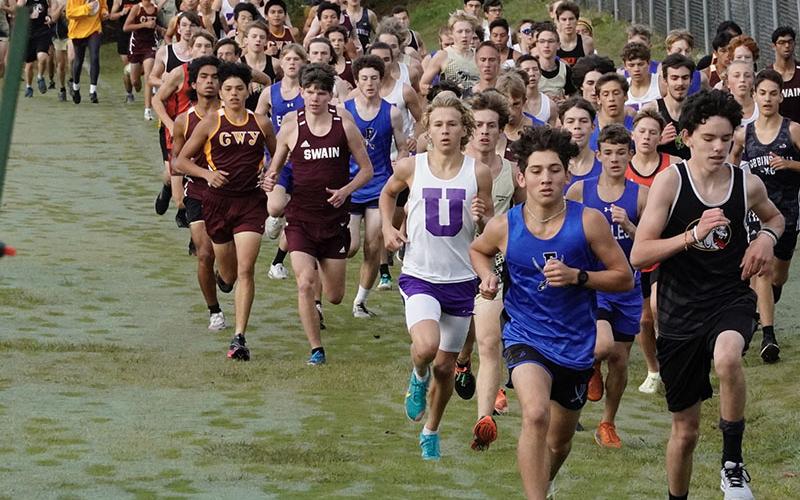 Zechariah Prater leads the pack in the Cross Country race at Murphy High School, Prater would end up finishing fourth and the Rebels team would finish third out of 11 competing teams.
