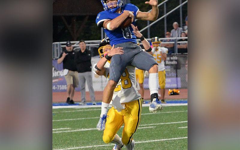 Corbin Davenport went high in the air for the Fannin County Rebels to make this catch against the visiting Murphy High School Bulldogs Friday night at the Fannin County stadium.
