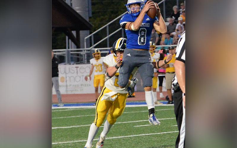 Corbin Davenport went high in the air for the Fannin County Rebels to make this catch against the visiting Murphy High School Bulldogs Friday night at the Fannin County stadium.