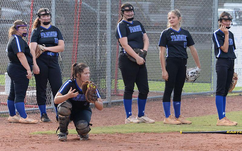 The Lady Rebels softball team gets warmed up and ready to play at a recent game. Shown are, from left, Krislyn Odom, Natalie Herendon, Rachel Adams, Sydney German, Aaleyah Rogers and Chesley Frye kneeling.