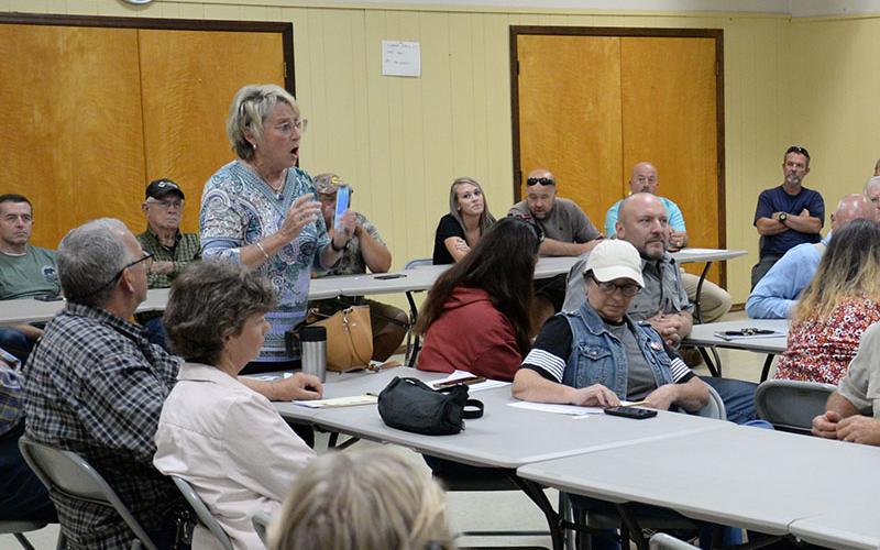 Susan Eippert, standing, was one of the many residents who expressed their displeasure with the Tennessee Department of Environment and Conservation and even more so with Copperhill Industries, LLC, during a meeting of the Polk County commission’s Building and Grounds Committee at the Copper Basin Community Center. At the end of the meeting, TDEC representative Troy Keith said he plans to recommend the use of biosolids in the Basin be reconsidered.