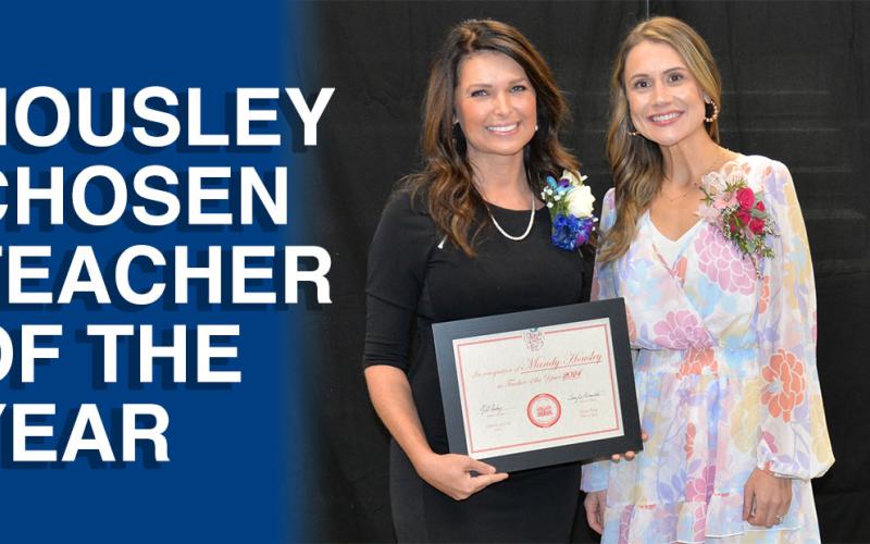 Mandy Housley, left, was named the Fannin County School System’s Teacher of the Year during a banquet Tuesday, September 13, at the system’s Agriculture Facility. She is shown with Alex Whitener who was chosen as the system’s runner up. Housley will now represent Fannin County in statewide Teacher of the Year competition.