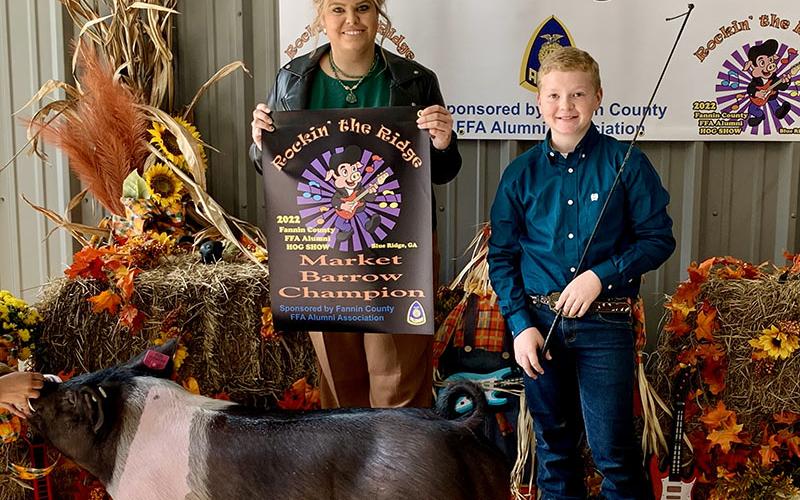Owen Norton was the Grand Champion Market Barrow Winner at Rockin’ the Ridge. Cora Beth Key, left, was the livestock judge.