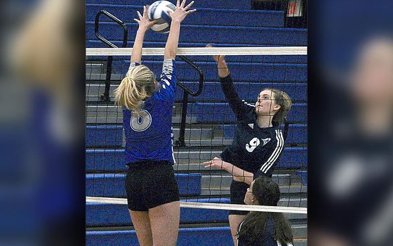 Ava Queen (6) elevates to block the Fellowship Christian hit. Queen was able to get her hands on it and get it down for a point and the serve back.