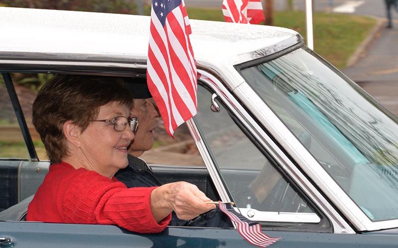 United States flags were plentiful during Saturday’s parade to honor Veterans Day.