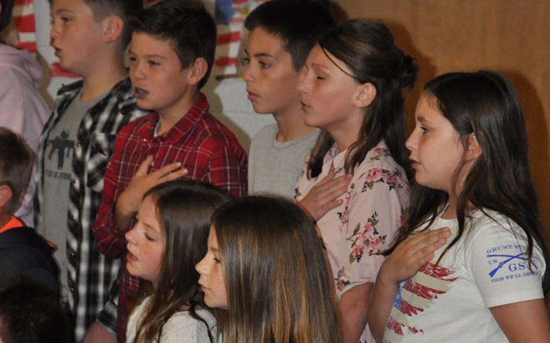 Pictured at East Fannin Elementary’s Veteran’s Day Program doing the Pledge of Allegiance are, from left, back row, William Powell, Clay Maddox, Wyatt Keleher, Bella Davenport and Bristol Falls. Bottom row, from left, are Lacey Hall and Sophie Price.