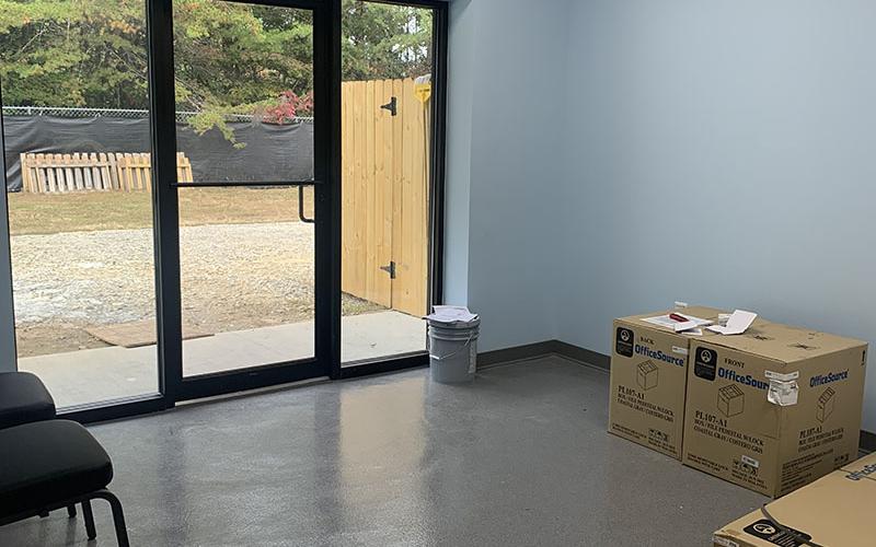 The lobby/reception area of the new Humane Society of Blue Ridge clinic is shown almost completed with a view of the yard outside.