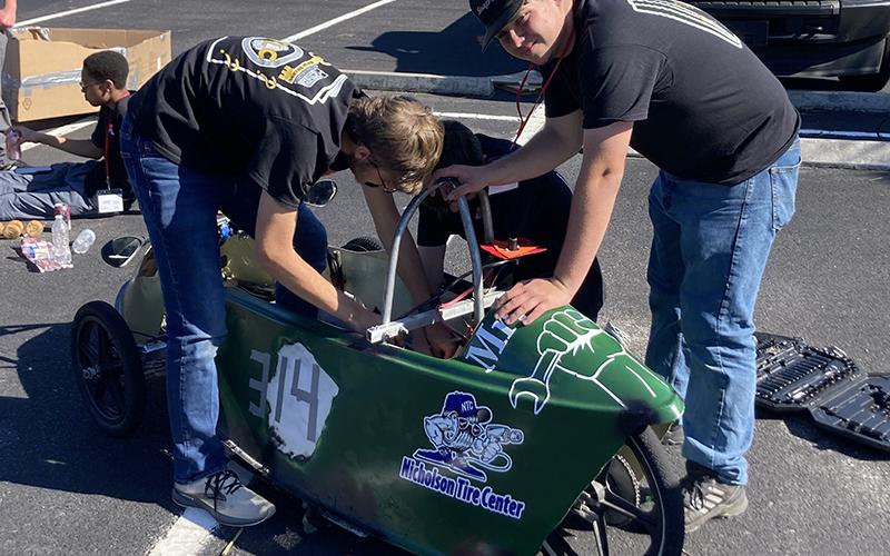 The Pit Crew for the electric car race, James Kyle, Luke Pelfrey, and Bryson Mitchell, were among the Fannin County High School and Fannin County Middle School Technology Student Association members who traveled to Jekyll Island for the TSA Fall Conference.