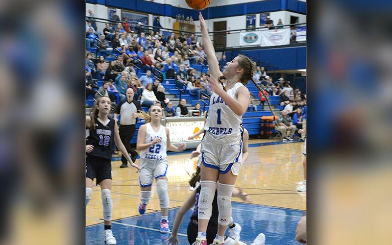 Courtney Davis puts up two points for the Lady Rebels in recent basketball action. Davis led the Fannin squad with 19 points in the region win over Model.