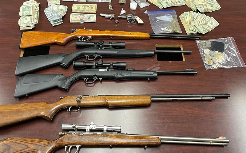 Approximately 50 grams of methamphetamine, an assortment of rifles and pistols, and $10,000 in U.S. currency were seized when a multi-agency law enforcement effort brought down a drug trafficking organization operating in the tri-state area.