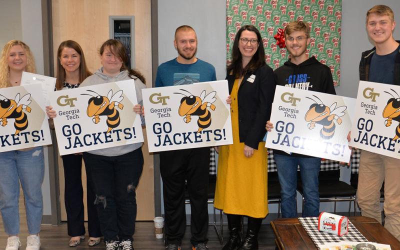 Five Fannin County High School seniors were surprised Friday morning, December 9, when they were presented acceptance letters to attend the Georgia Institute of Technology in the Fall of 2023. Shown during the presentation are students and Georgia Tech representatives, from left, McKenzie Chastain, Mary Tipton Woolley, Kaitlyn Nelson, Sam Jabaley, Katie Mattlie, James Kyle and Bryce Ware.