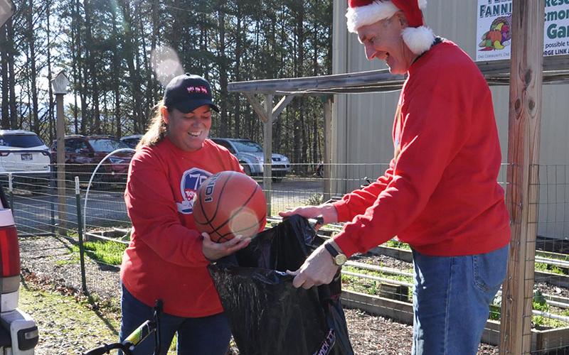 The Toys for Tots annual Christmas toy distribution was held Friday, December 16, and Saturday, December 17, at Fannin County Family Connection in Blue Ridge. Toys for Tots Coordinator Cheryl Jordan and Ian Guttridge were two of the many volunteers who helped pass out the thousands of toys donated this year.