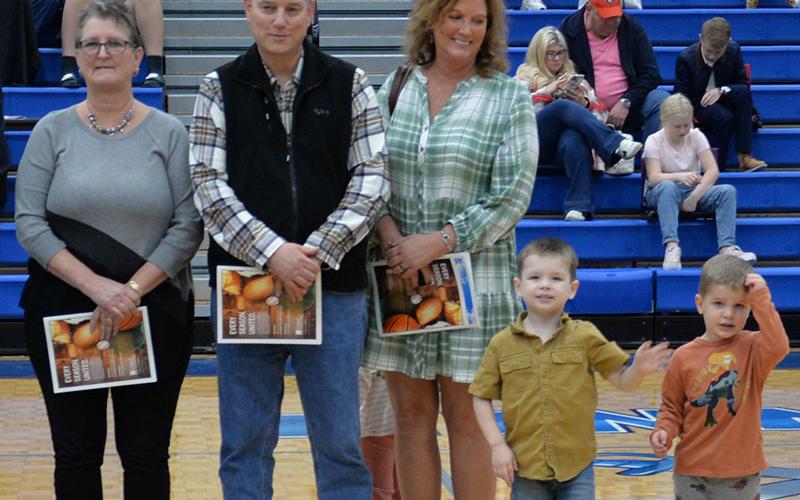 Long time Fannin County coach Jack Myers was represented by  his two daughters, Jackie, left, and Laura; son Lyle Myers; and grandchildren when he was announced as a Hall of Fame inductee.