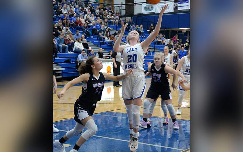 Lady Rebel Senior Ava Queen goes up on the left side of the paint to add a lay up in recent action for the Fannin County Lady Rebels. Queen scored seven points in the Lady Rebels region victory over North Murray High School last week.