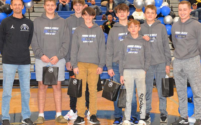 The 8th Grade Rebels basketball players were recognized at halftime of the Fannin County High School Lady Rebels basketball game Friday, January 20. The 8th grade team earned the title of MAC Runner Ups and the 7th grade team won the MAC Championship. Shown are, from left, Head Coach Jeff Daves, Keaton Watkins, Kolton Kaylor, Camden Wolsey, Kylan Dover, Kole Foster, Rylan Davis and Assistant Coach Lucas Walden.