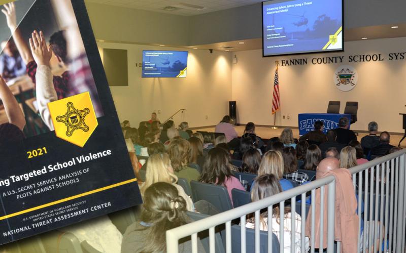 Members of the Fannin County School System who took part in Threat Assessment Training received the U.S. Secret Service anaylsis on Averting Targeted School Violence (left) along with two other publications aimed at taking a pro-active approach to stopping any attacks before they occur. Below, School Superintendent Dr. Michael Gwatney talks to the morning session gathering who packed the Staff Development Center Tuesday, January 3.