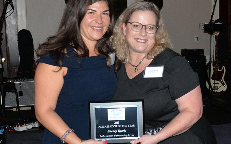 The Fannin County Chamber of Commerce Ambassador of the Year award went to Shelley Eyerly, right. It was presented by Chamber President Christie Gribble. The award recognizes the ambassador for involvement in Chamber events.
