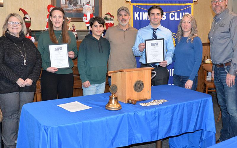 Joshua Munoz, third from right, was Mountain Area Christian Academy’s (MACA) representative in the county wide  Student Teacher Achievement Recognition (STAR) program. He chose Rachel Jones, second from left, as his STAR teacher. Shown during the Kiwanis Club of Blue  Ridge banquet honoring all the STAR standouts are, from left, MACA Administrator Stephanie Hopper, Jones, Jonah Munoz, Jeff Munoz, Munoz, Mirian Munoz and Kiwanian Troy Shirbroun.