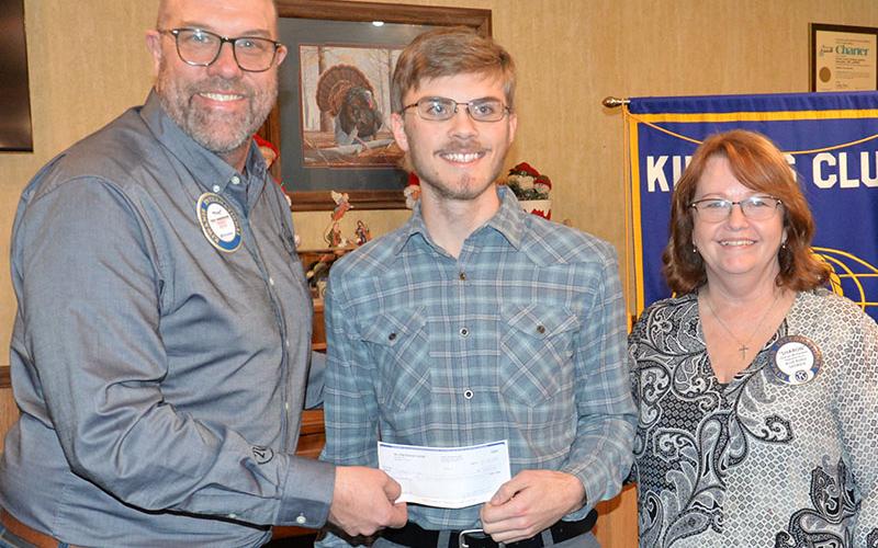 Troy Shirbroun of the Kiwanis Club of Blue Ridge presented James Kyle a $1,000 in recognition of being named this years Student Teacher Achievement Recognition (STAR) student. Kiwanian Sharon McFarland is at right.