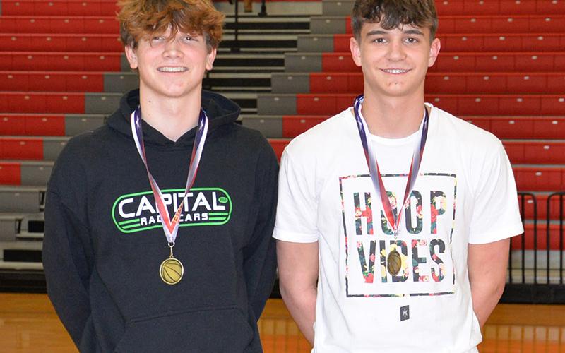 Riley Angel, left, and Justus Hamby, right, were the Cougars named to the All-District Tournament team.