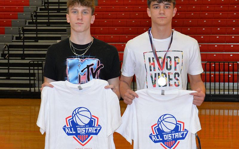 Connor Kimsey, left, and Justus Hamby, right, were awarded for being All-District first team selections.
