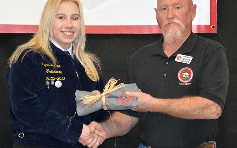 Ryan Larson was one of four Fannin County High School graduating seniors honored for their contributions. She accepted her award from Kenny Queen.