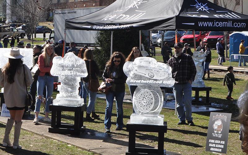 This crowd is pictured enjoying the Ice Sculptor display at the 12th Annual Fire &amp; Ice Chili Cook-off and Beer Festival in downtown Blue Ridge.