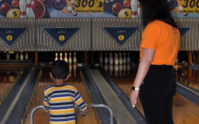 West Fannin Elementary student Raymond Evans is pictured lining up to bowl at last week’s Special Olympics event at Fannin Lanes.