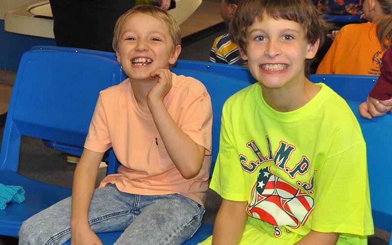 These youngsters were all smiles as they patiently waited their turn to bowl at Fannin Lanes when the Special Olympics annual bowling outing returned there last week.
