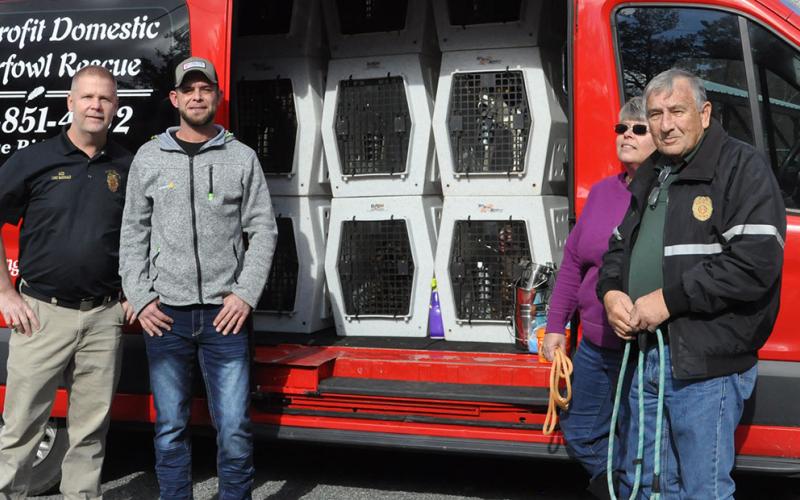 Fannin County Animal Control transported 17 dogs from their facility and three dogs from Gilmer County Animal Control January 26, after being at full capacity in the shelter. Pictured, from left, are Animal Control Officer Luke McDonald, Brandon Miller, Animal Control employee Theresa Burgess and Animal Control Officer JR Cornett.