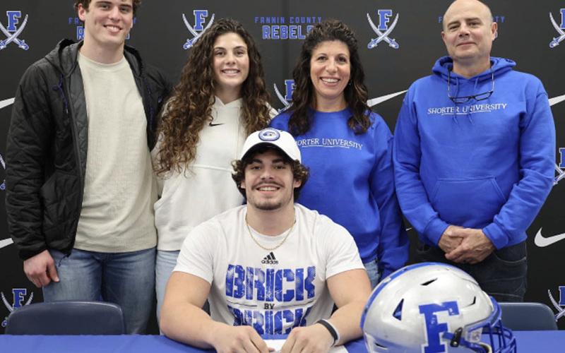 Fannin County High School senior Andrew Waldrep signed his letter of intent Wednesday, February 1, to further his athletic and academic career at Shorter University as a part of the football team. Waldrep is pictured with Evan Taylor, Emily Waldrep, Valerie Waldrep and Brian Waldrep.