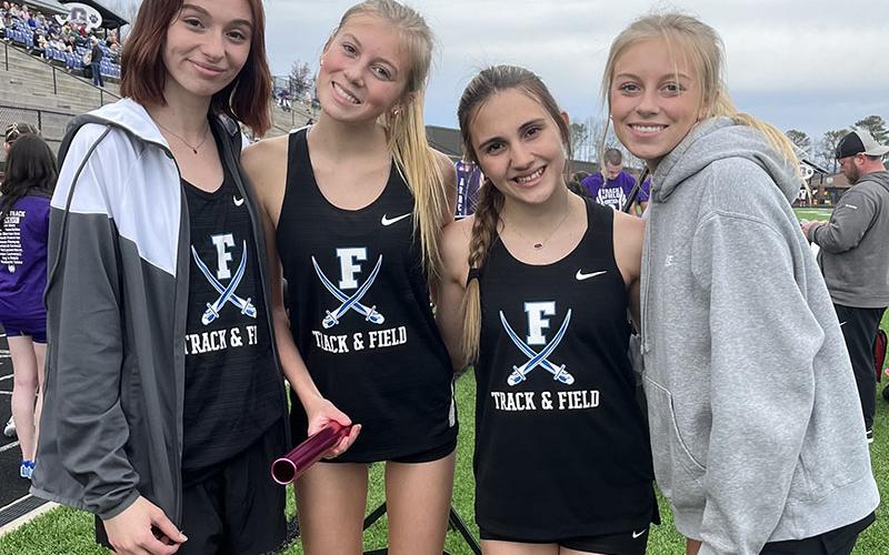 The Fannin County girls’ 4x800 relay team smiles after a victory at a recent track and field meet. Shown are, from left, Caylee Gaddis, Lindsey Holloway, Karli Sams, and Carlee Holloway.
