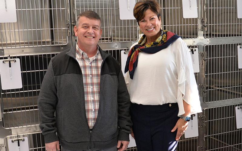 Diane Basco, right, showed Jamie Hensley the new cages that will be used at the humane society’s low cost veterinary clinic.