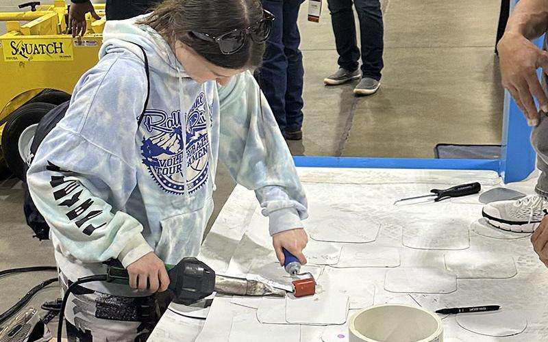 Bailee Stiles works on a project at the SkillsUSA state conference in Atlanta.