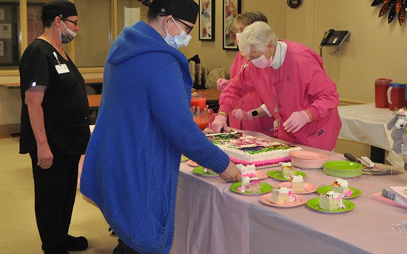 Fannin Regional Hospital employees Brenda King and Denise Elliott took advantage of the reception March 20 hosted by the hospital Auxiliary.