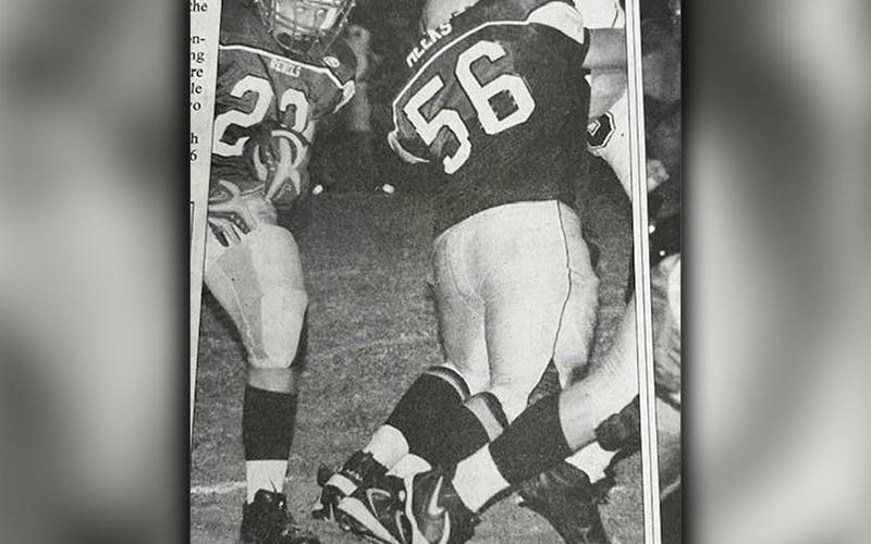 Bryant Meeks creates a hole for a Rebel running back during his high school career.