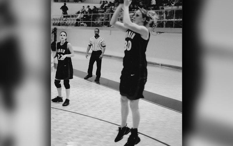 Alden Acker launches a jump shot from the corner.