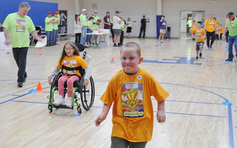 Allie Thomas and Brayden Mullins race to the finish during the Fannin County Special Olympics Track and Field Day Friday, April 14, at the Fannin County Recreation Department. Both are from Blue Ridge Elementary School.