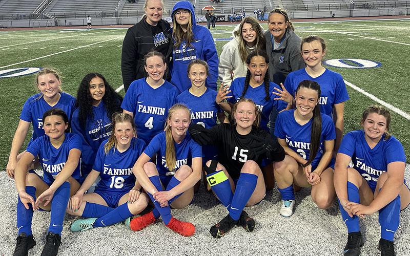 The Fannin County women’s soccer team smiles together after securing their playoff spot. Shown are, from left, front row, Natalie Middleton, Jordan Golden, Adia Galloway, Ivy Hyde, Madison Ponton and Maya Butler; middle row, Shaylee Jones, Nadia Rosas-Leal, Caroline Young, Karmah Eaton, Stephanie Kirk and Reese Lewis; back row, Assistant Coach Jordan Deal, Jayda Foster, Alexandria Foster and Head Coach Nancy Jessen; and not pictured, Emma Richardson and GiGi Torres.