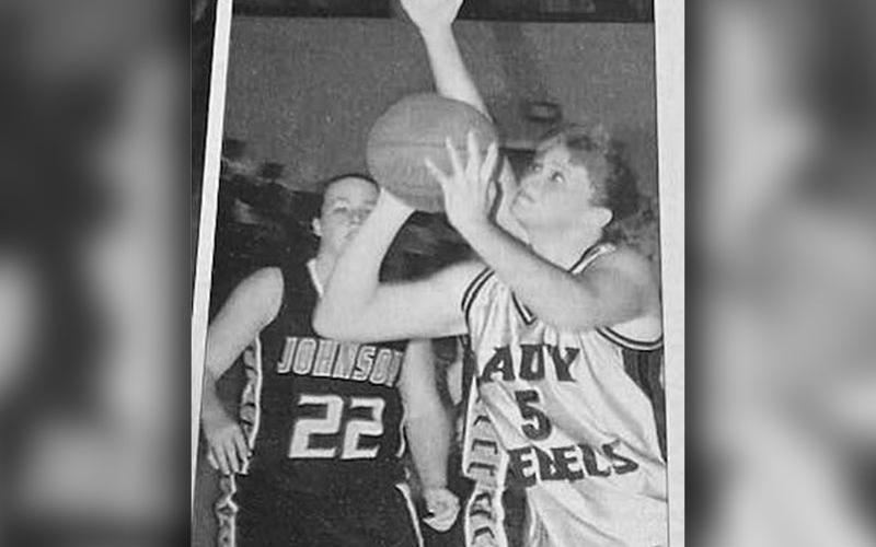 Melissa Roberts battles inside as she goes for two points for Fannin County.