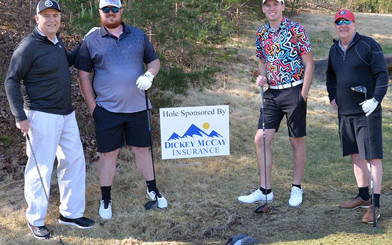 The Dickey McCay Insurance Team of Mark Vaughn, David Brooks, Chance Watson and Mark Brooks, from left, took a short break on the Old Toccoa Farm golf course during the memorial tournament honoring Corporal Richard Gazaway of the Fannin County Sheriff’s Office.