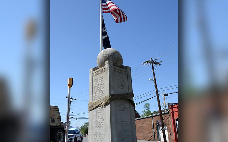 The first step in moving the Veterans Monument was to safely break it loose from the base that has supported it since 1946.