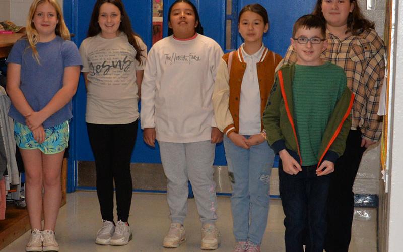 East Fannin Elementary School students Learh Rittenberry, Bristol Falls, Lynette Agustin Morales, Ella Pace, Baillie Traylor and Matthew Marlowe welcomed Fannin County Board of Education members and other system officials during the board’s Spring 2023 training session.