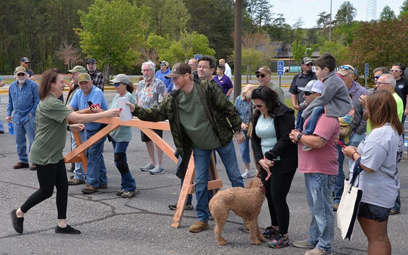 Dawn Cochran hands out a door prize to one of the lucky drawing winners at Saturday’s Riding the Ridge, an annual event held to raise funds for Shop With a Cop. Anyone wishing to donate to Shop With a Cop can do so at the Fannin County Sheriff’s Office or mail a check to P.O. Box 1706, Blue Ridge, Georgia, 30513.